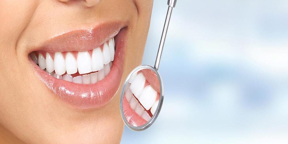 Smiling woman at dentist