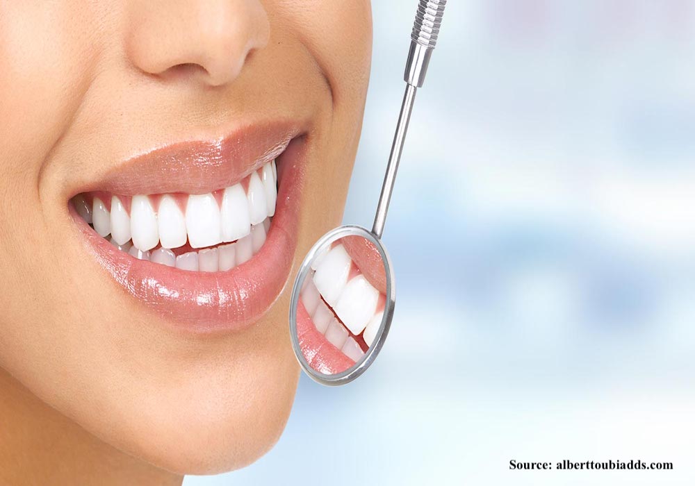Smiling woman at dentist